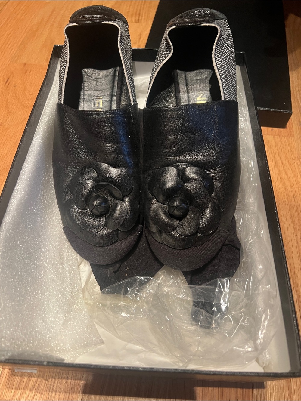 CHANEL Black Leather Camellia Slip-On Flats